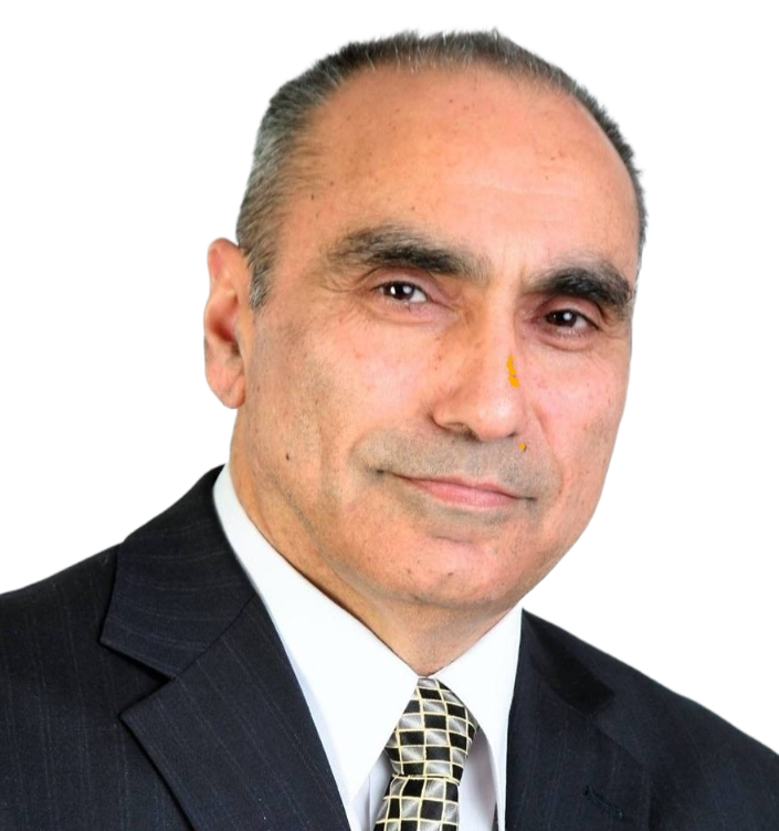 Sam Farmaha, a Toronto real estate realtor, appears in a dark suit, white shirt and patterned tie against a plain white background.